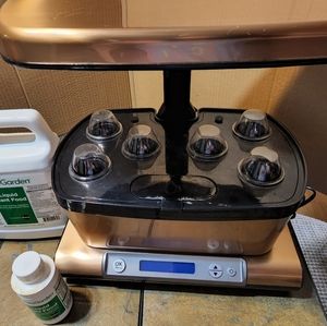 USED 6 POD AEROGARDEN with plant food